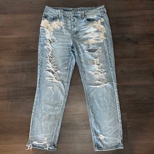 American Eagle Tomgirl style jeans with crochet detailing and distressing